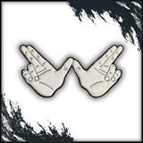 An enamel pin featuring two hands forming a 'Flying W' gesture, inspired by iconic alt-rock fan culture. The pin has a silver-tone design with detailed linework, set against a white background with edgy black brushstroke accents.